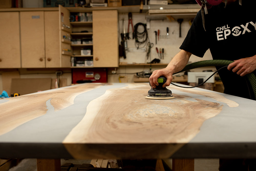 sanding a river table with a festool sander