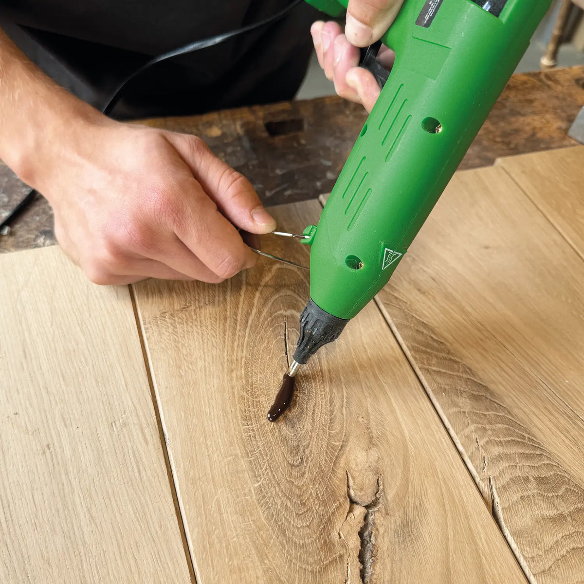 Wood Repair Plus+ Kit in action on a piece of White Oak